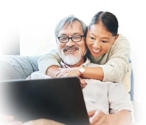 laptop smile and senior couple on a sofa (card)